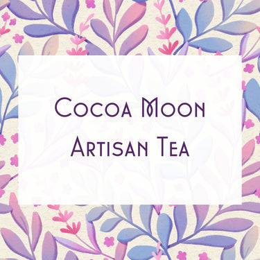 A white rectangle with the text Cocoa Moon 🍫🌙 – Your Chocolate Lullaby in a Cup is centered on a pastel floral background of purple, pink, and blue leaves and branches, ideal for highlighting this soothing caffeine-free honeybush lavender tea.